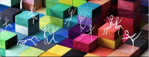 Symbolbild: bunte Würfel und tanzende Strichmännchen