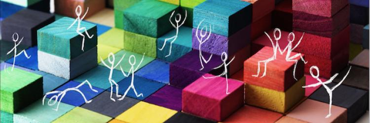 Symbolbild: bunte Würfel und tanzende Strichmännchen Symbolbild: bunte Würfel und tanzende Strichmännchen